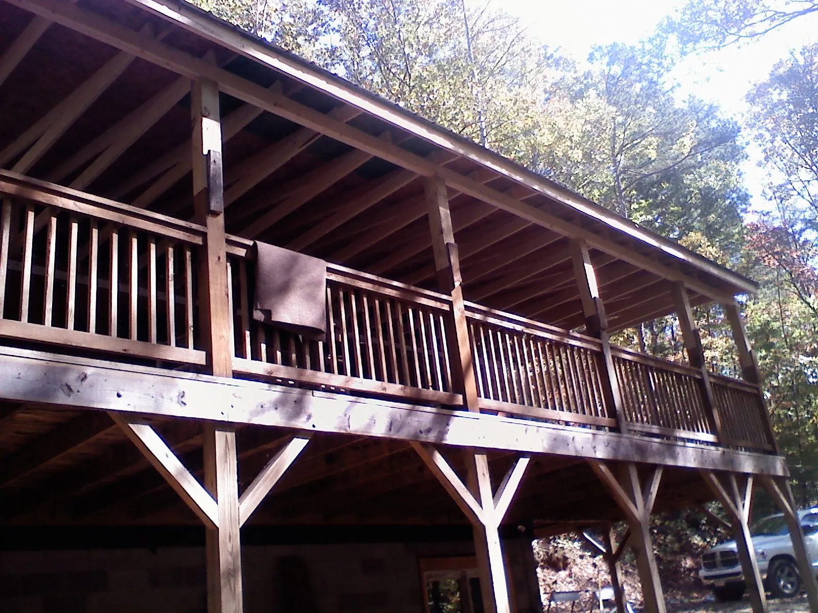Timber framing under a new elevated porch and deck — Roof Leak Repair in Rhinelander by Roofing Brothers